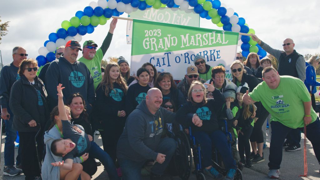 A Buddy Walk Family Fun Day team gathered together