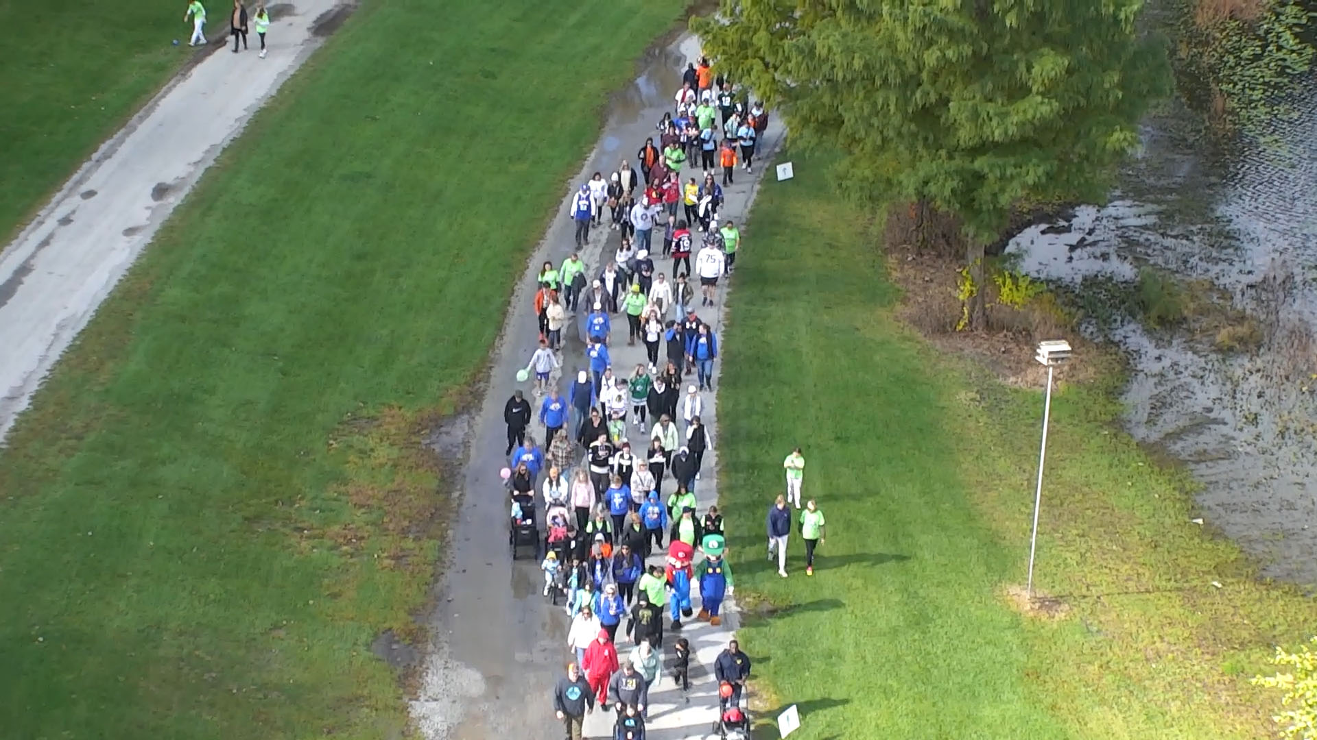 Hundreds of walkers making their way along the path at the Buddy Walk Family Fun Day